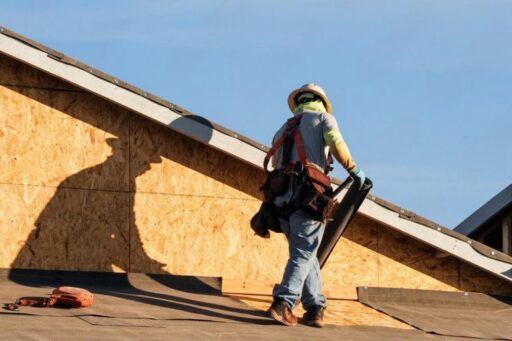 Roof underlayment installed over roof sheathing as part of a new roofing system